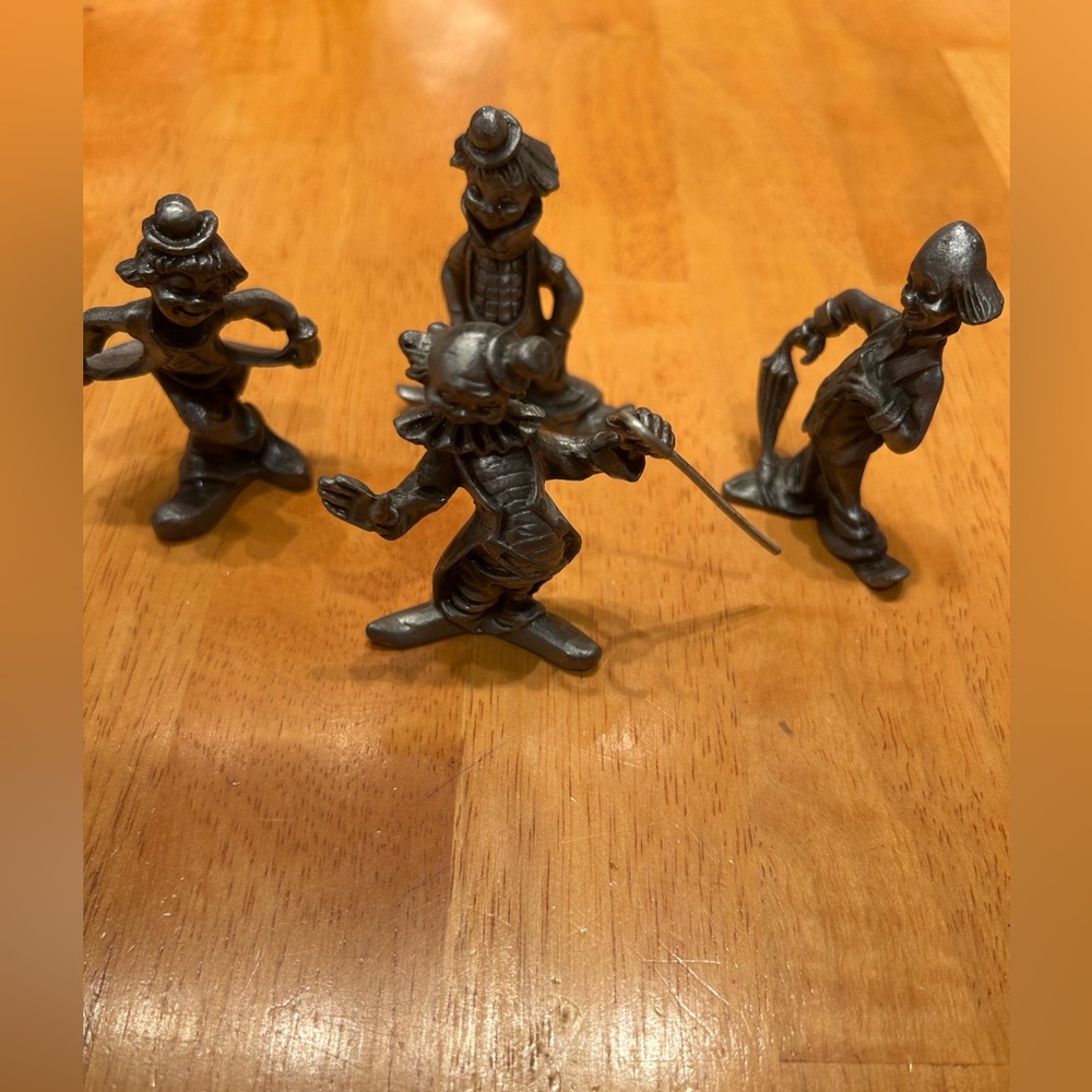 Set of Four Silver Clown Figurines